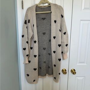 Amazon Beige Cardigan with Black Heart Pattern
